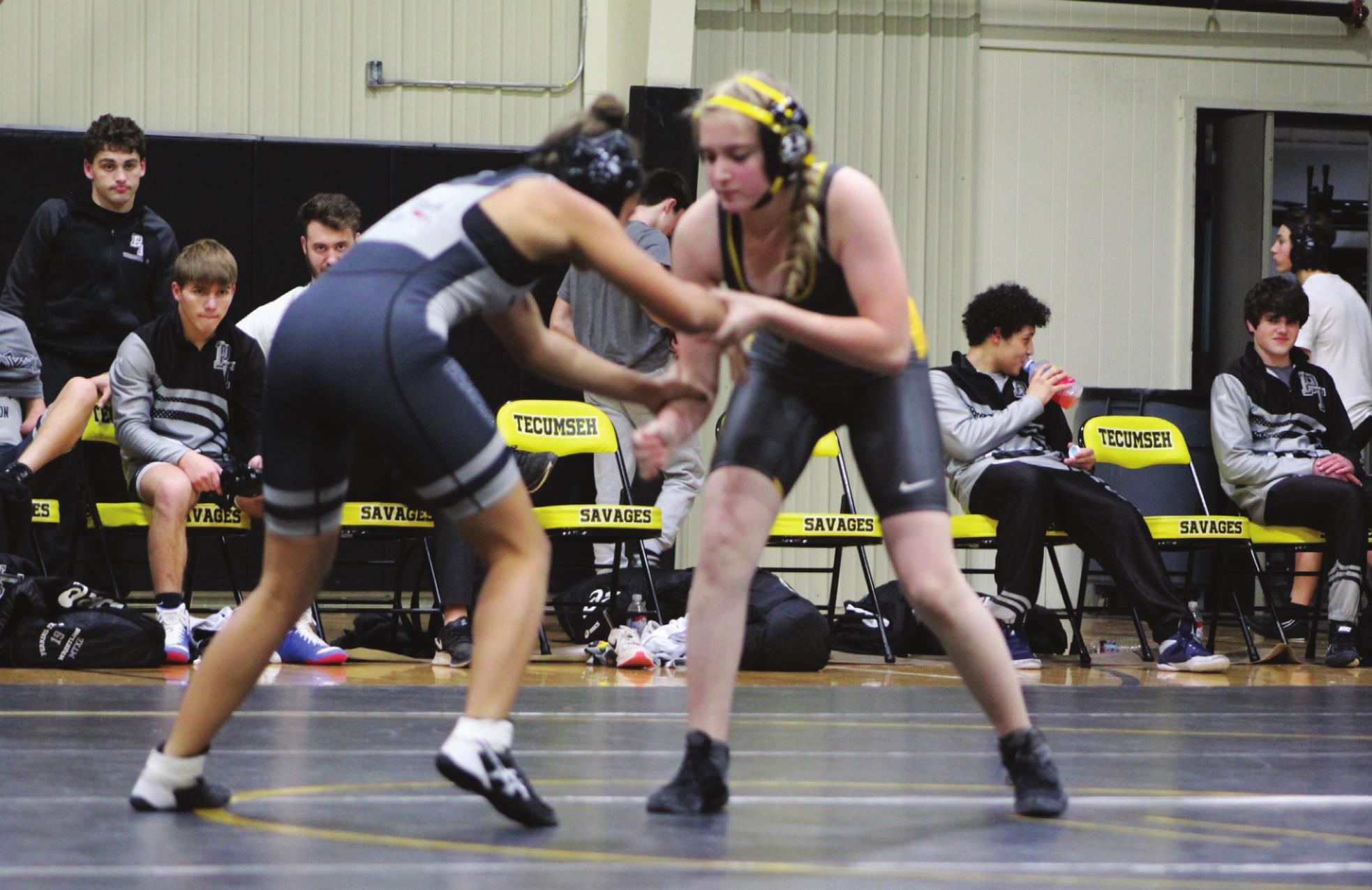 Tecumseh’s Kallie Kinslow, right, wrestles in an exhibition match during the dual meet against Perkins-Tryon on Jan. 4. Countywide &amp; Sun/Natasha Dunagan
