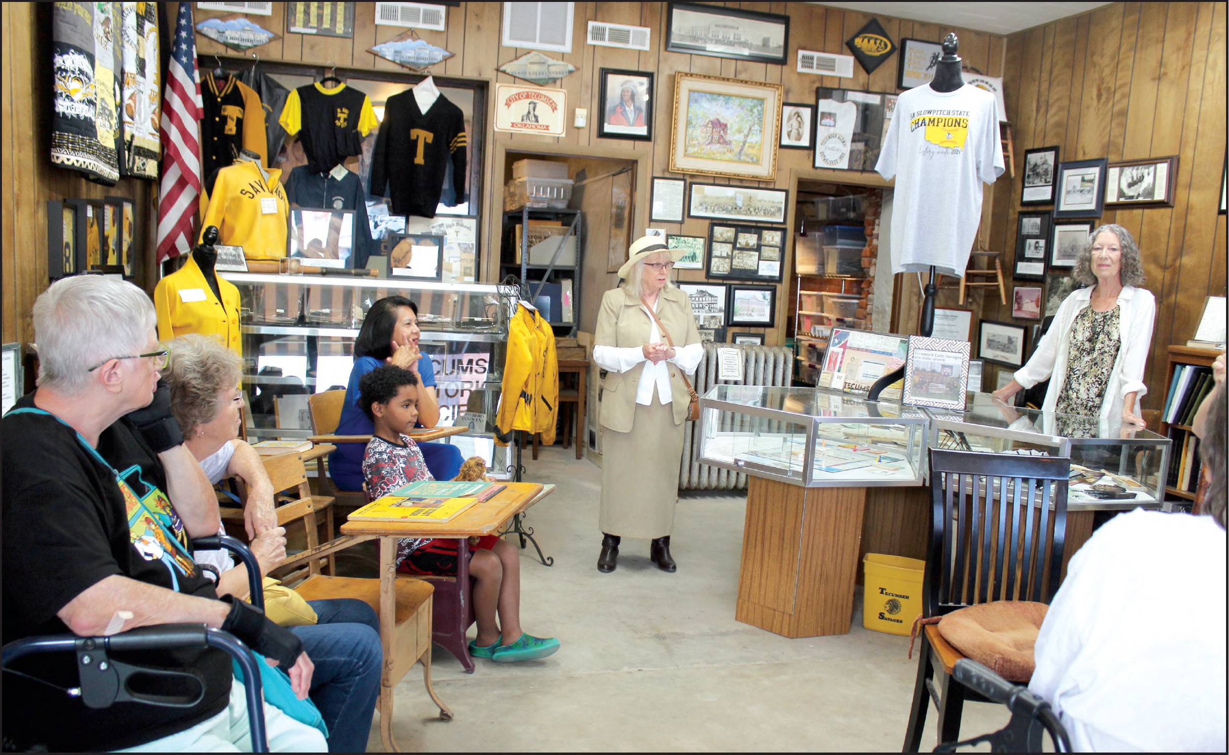 Tecumseh Historical Society Museum Volunteers Arthenia Haney and Ruth Beasley speak about the Tecumseh school memorabilia in the museum during the Tecumseh Pioneer Library’s “In My Experience: Tecumseh History” tour on July 16. The library will have a “Party at the Park - Summer Learning Challenge Celebration” for children and teens today (July 25) at Slick Humphrey Park from 2-3 pm. Countywide & Sun/Natasha Dunagan