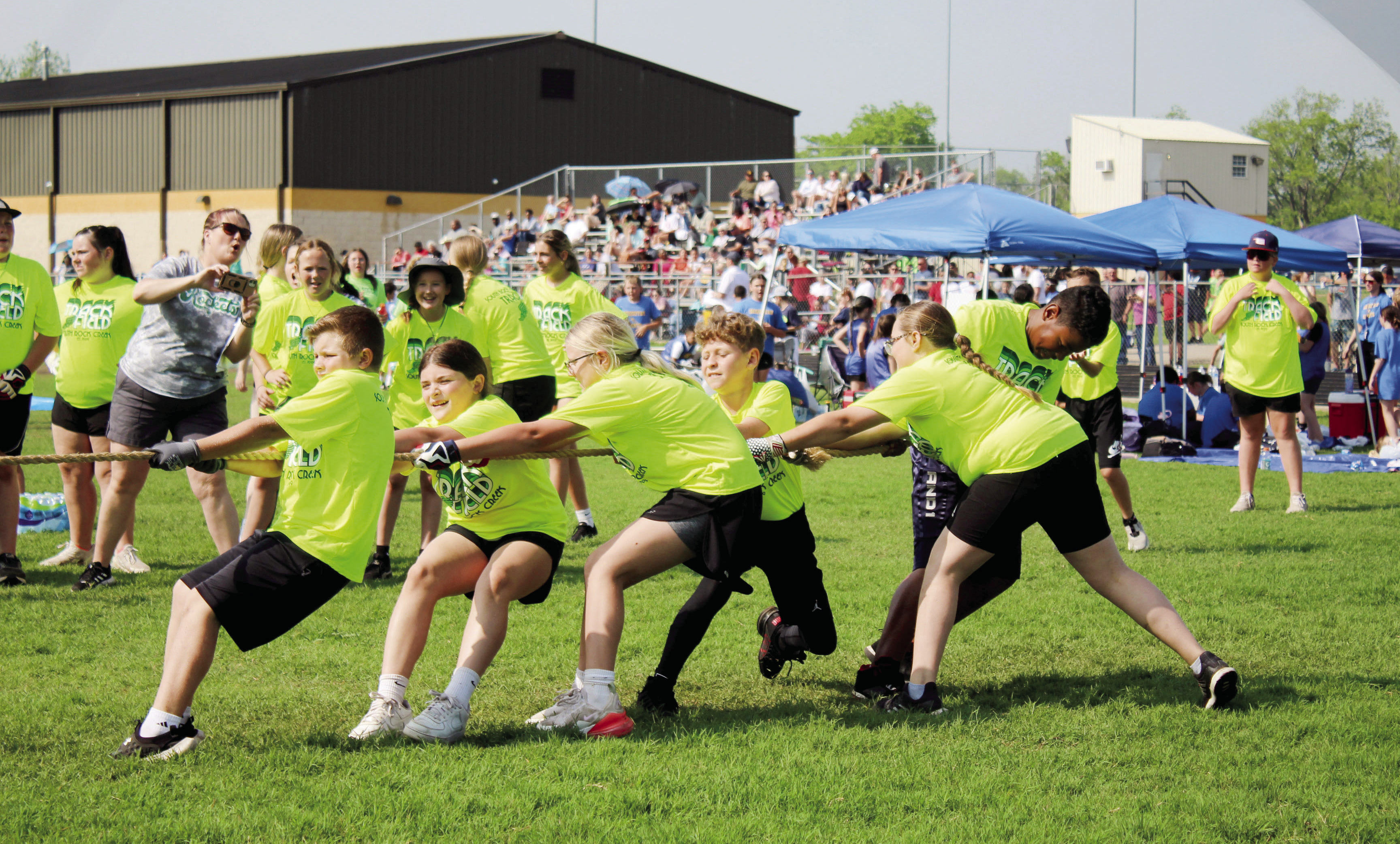 South Rock Creek School fourth-grade students use upper and lower body strength in the tug o' war during the Kiwanis Club's Little Olympics on March 12. The event was held at the Tecumseh High School track this year, due to tornado damage at Shawnee High School's Jim Thorpe Stadium. Assistant Scorekeeper Erika Jones said there has only been one other time in Little Olympic's 90 years that it was held at a different location, and that was at OBU. Countywide & Sun/Natasha Dunagan