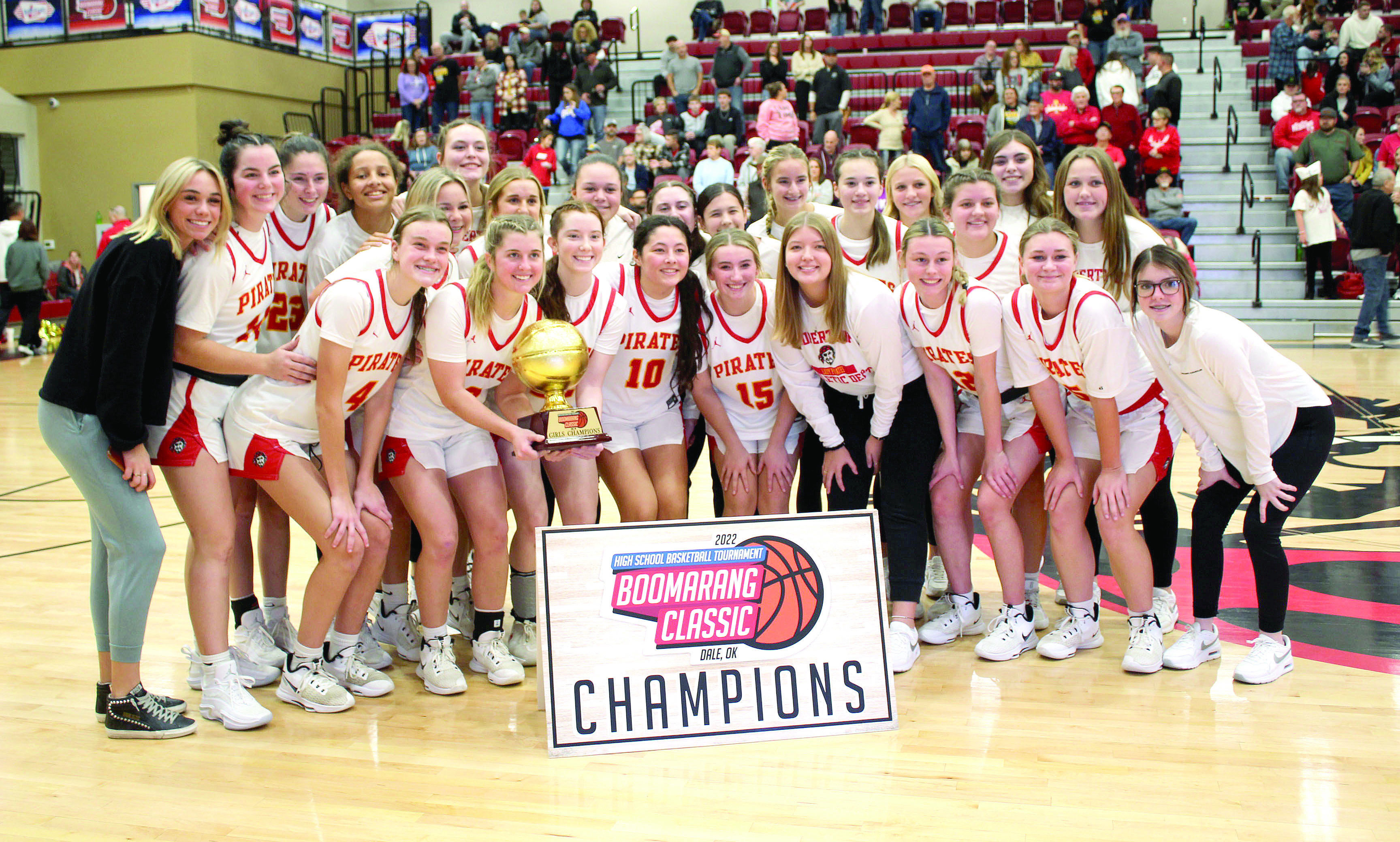 The Dale Lady Pirates pose after winning the girls bracket of the Dale Boomarang Classic on Dec. 10. The tournament was held at Dale, Dec. 8-10, and the Lady Pirates won all three of their games: Santa Fe South, 72-7; Millwood, 57-46; and Elgin, 47-26. Countywide &amp; Sun/Natasha Dunagan