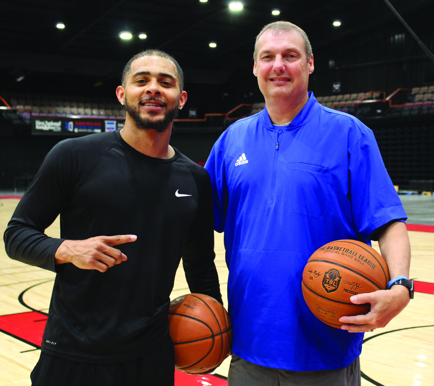 New Potawatomi Fire Coach Mark Dannhoff, right, poses at FireLake Arena with one of his players, Tevin Foster, who is returning for their second season. Dannhoff coached the Enid Outlaws last season, and a couple of his former athletes will be joining the Fire, as well. Countywide &amp; Sun/Natasha Dunagan