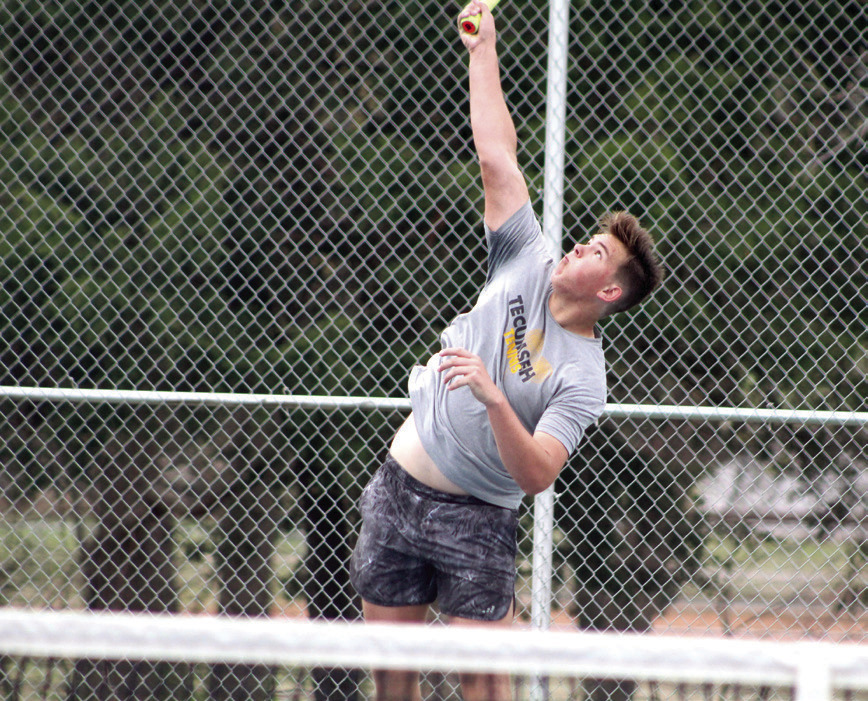 Tecumseh’s Brodey Bone reaches high as he serves on the #2 Doubles team with Aaron Sack during the Tecumseh Tennis Tournament on April 4. Bone and Sack placed fourth. The Tecumseh Boys Tennis Team also placed fourth overall. Dunagan