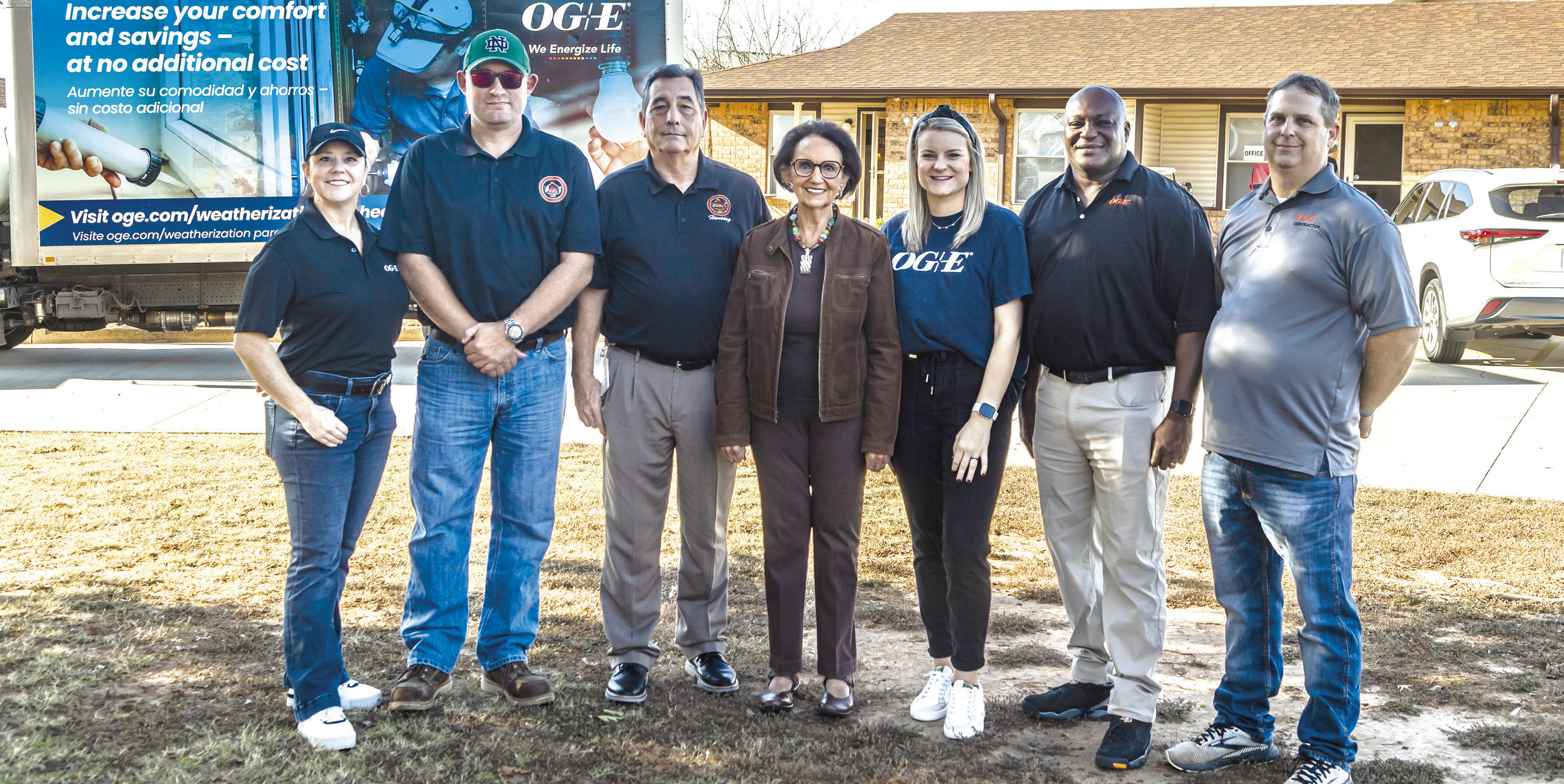 Citizen Potawatomi Nation Vice Chair Linda Capps (center) poses with OG&amp;E staff as the weatherization of the tribe’s Father Joe Murphy Elder Housing community in Shawnee began. Photo provided