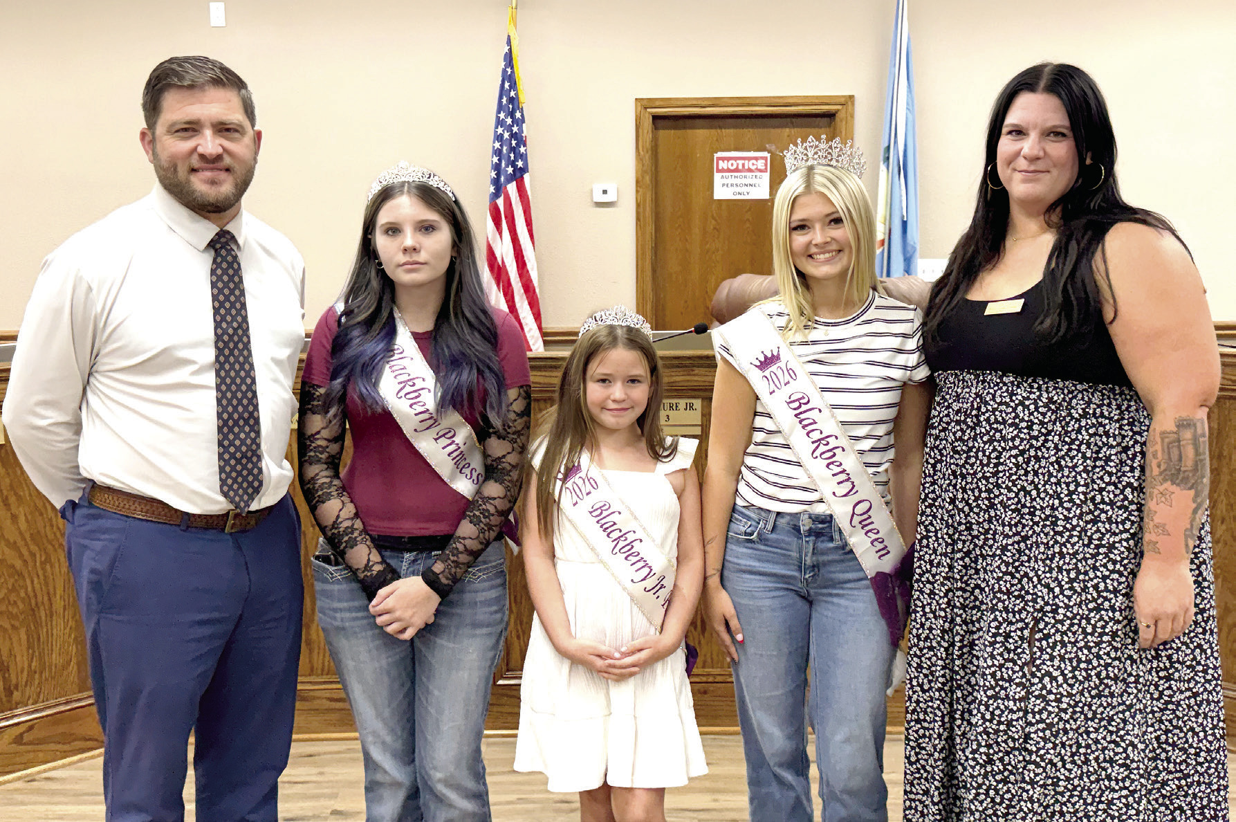 Blackberry Festival royalty was introduced at the Aug. McLoud City Council meeting. Posing with Mayor Daniel McClure (far left) and Chamber of Commerce Ex. Director Lisa Cox (far right) are: Princess Kyndall Reich, Jr. Princess Lorelai Cleary, and Queen Emma Hollingsworth. Julie Talton, Countywide &amp; Sun