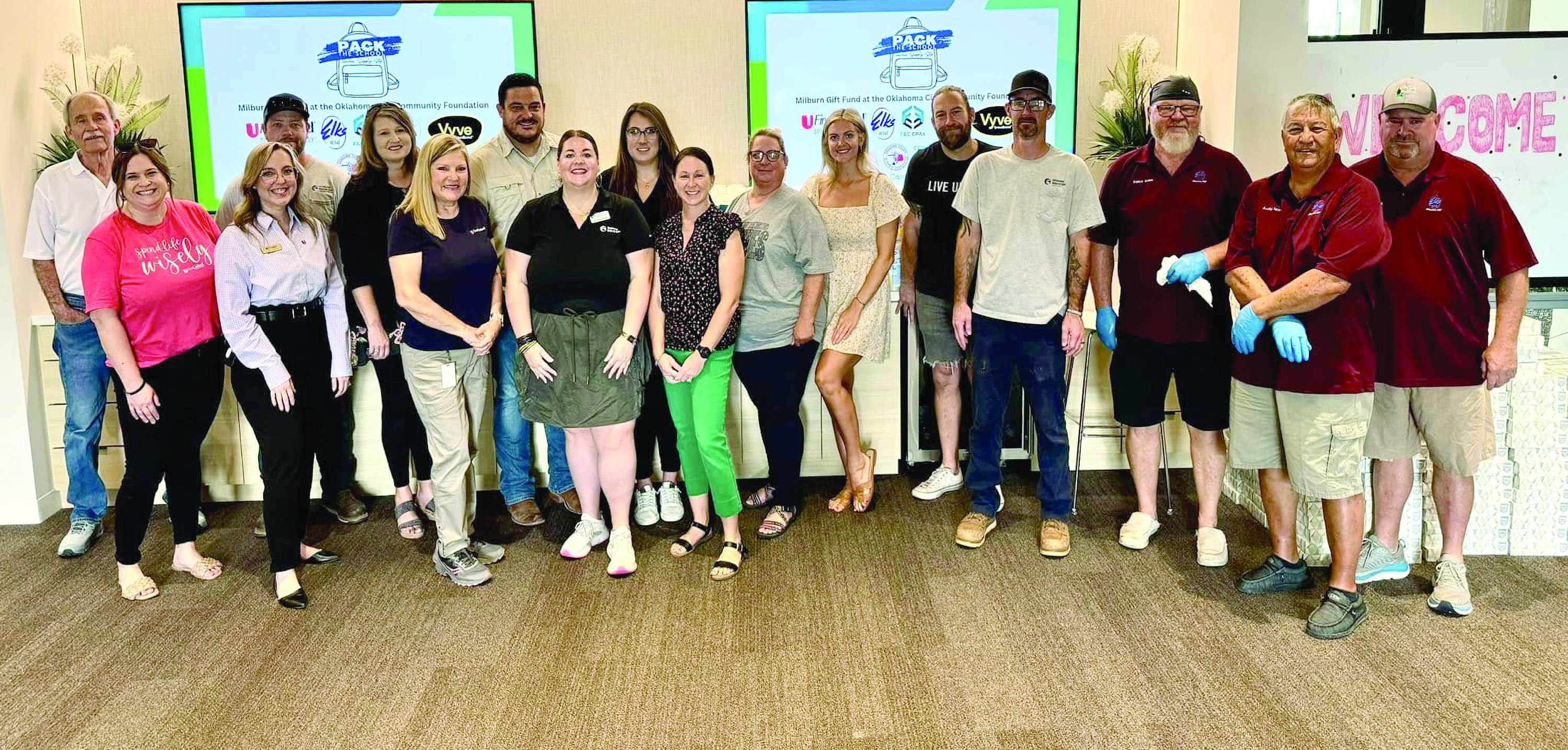Volunteers from partner organizations serve to make Pack the School a success