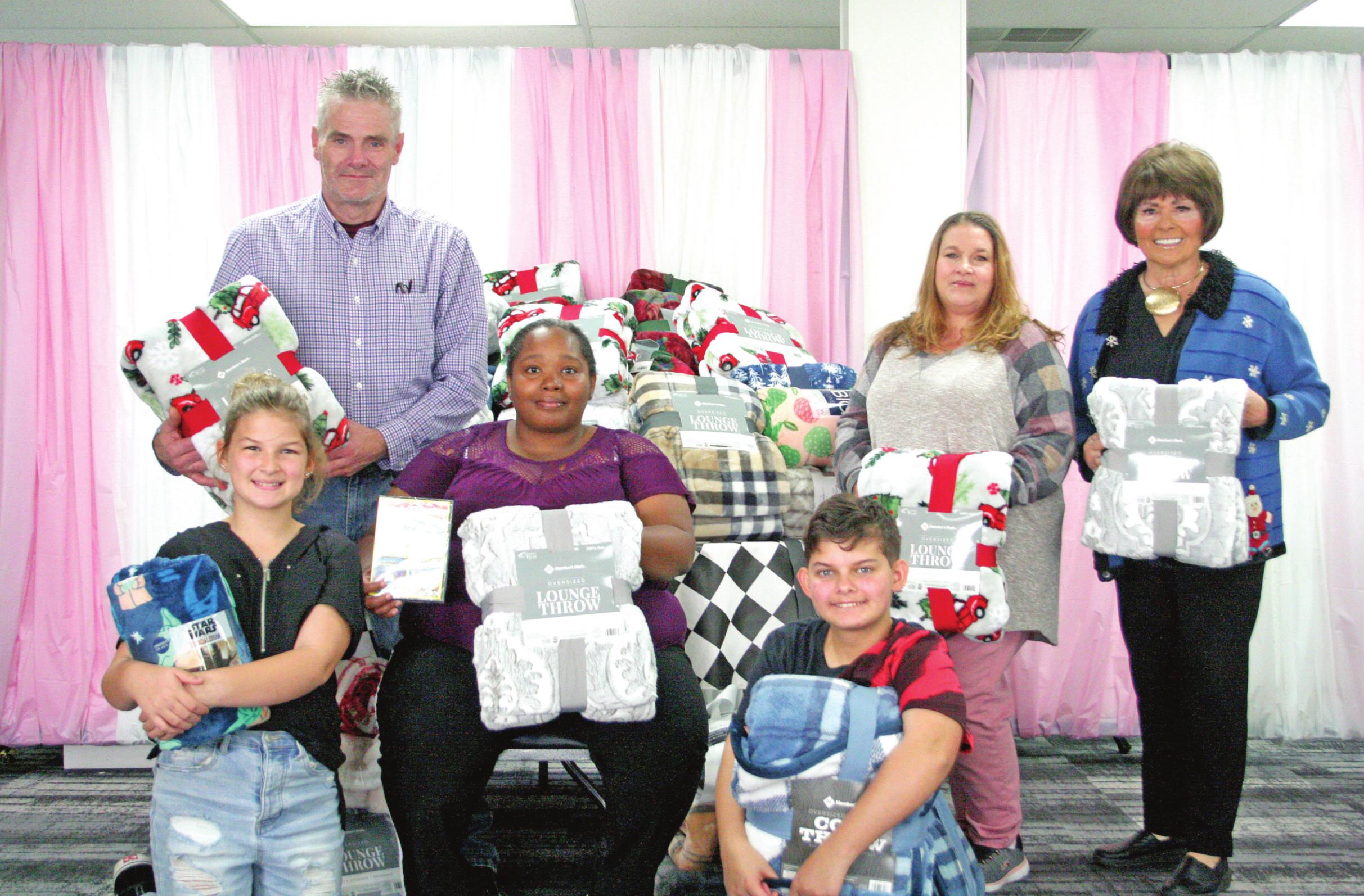 Volunteers Prepare A Trunkmas Party For Foster Children