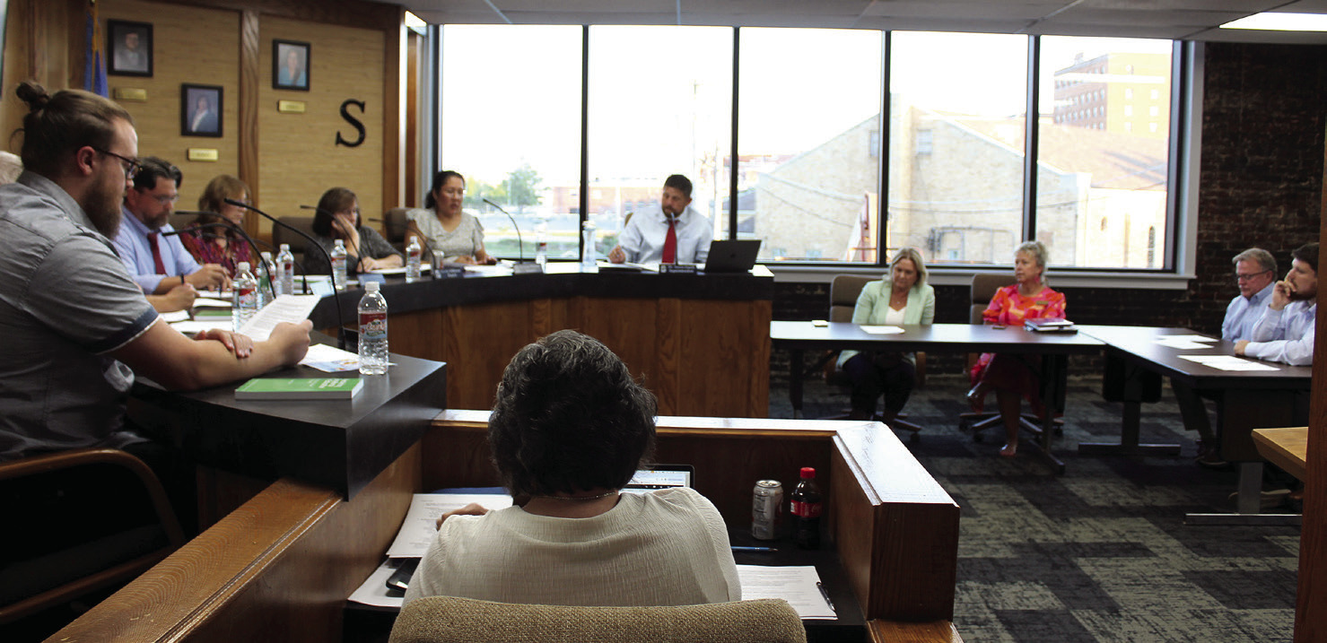 Shawnee Superintendent Dr. Aaron Espolt speaks to the Shawnee Board of Education at the Aug. 5 meeting. The board room was recently remodeled and the windows replaced.