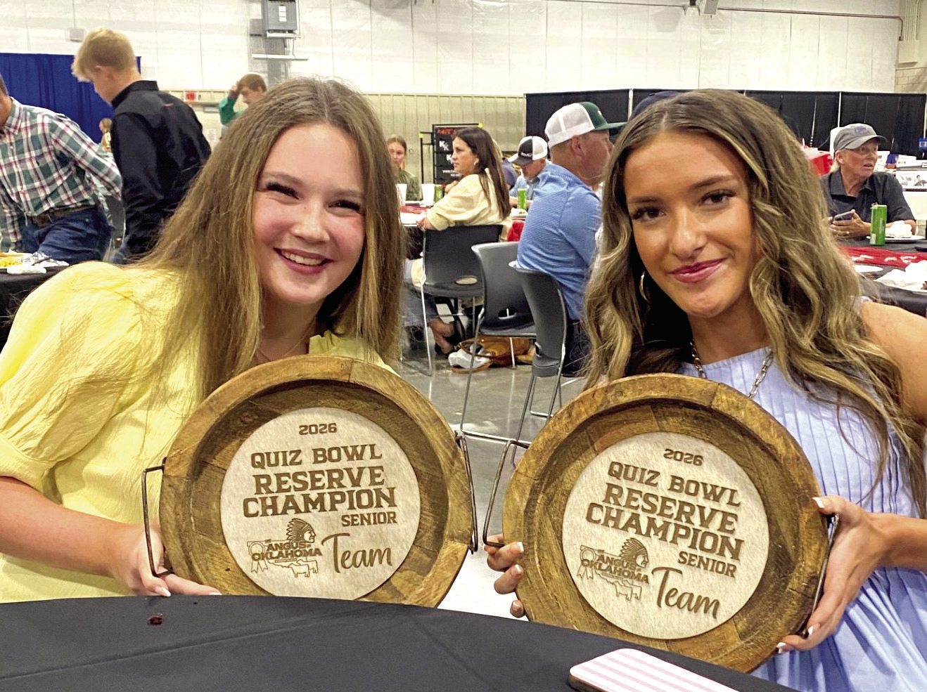 Taycie Baker and Madalyn Taron, both of Bethel, show their prizes for winning Quiz Bowl Reserve Champion Senior Team during The Fuzion by NAJRAE in Woodward last month. Photo provided