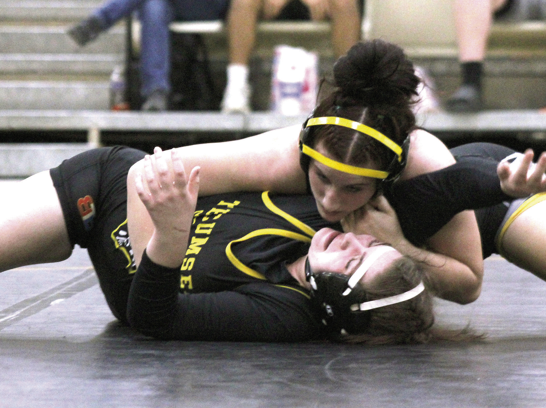 Kylei Gokey and Lowen Stell compete for the take down at Tecumseh's Black and Gold Dual held at the THS Alumni Center on Nov. 17. Cheyanna Dietz, Countywide &amp; Sun