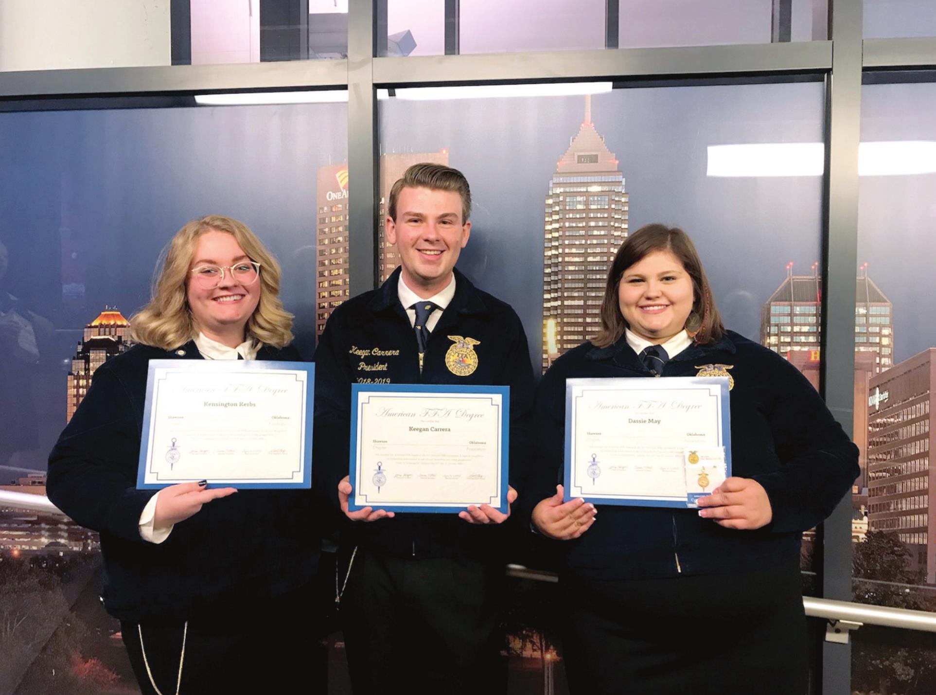Shawnee FFA Members Kensington Kerbs, Keegan Carrera, and Dassie May were three of nine from Pottawatomie County who received their American FFA Degrees in Oct. Photo provided.
