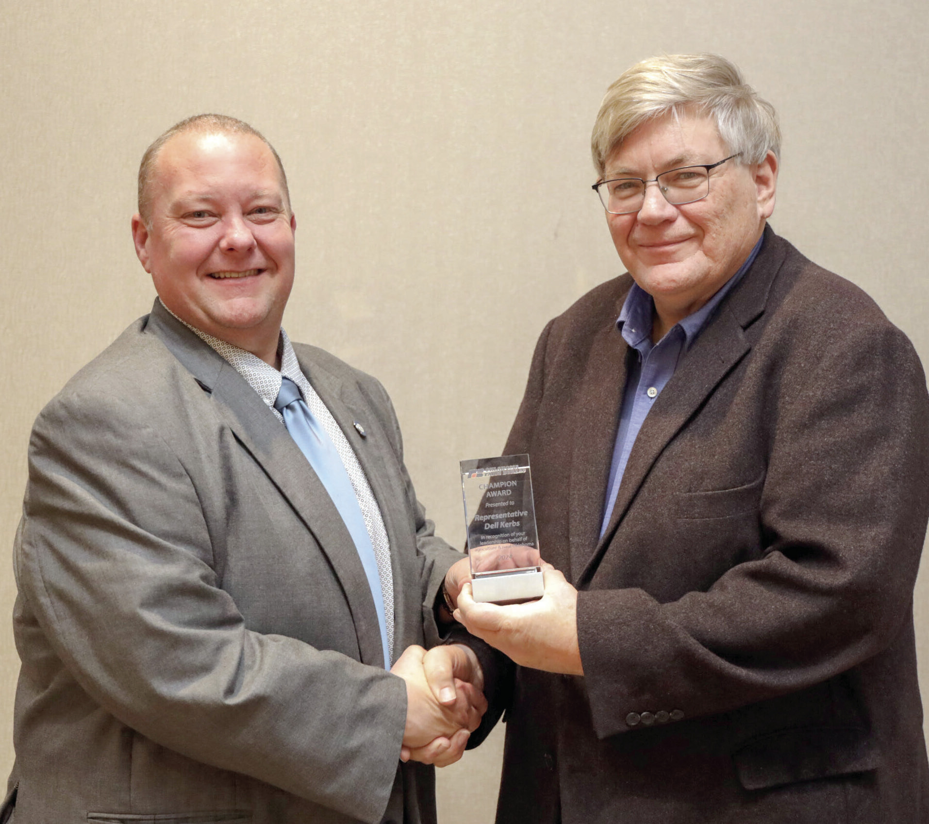 OKFB President Rodd Moesel (right) presents Rep. Dell Kerbs with an Oklahoma Farm Bureau Champion award at the 2024 OKFB Leadership Conference Feb. 13. Photo provided