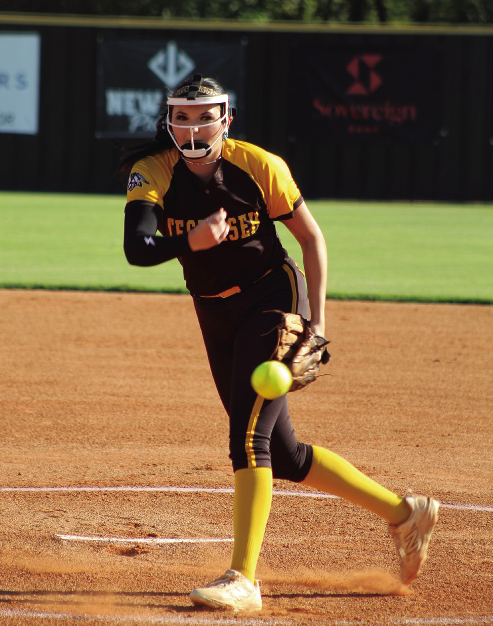 Tecumseh senior Jacee Townsend sails one over home plate in the first inning.