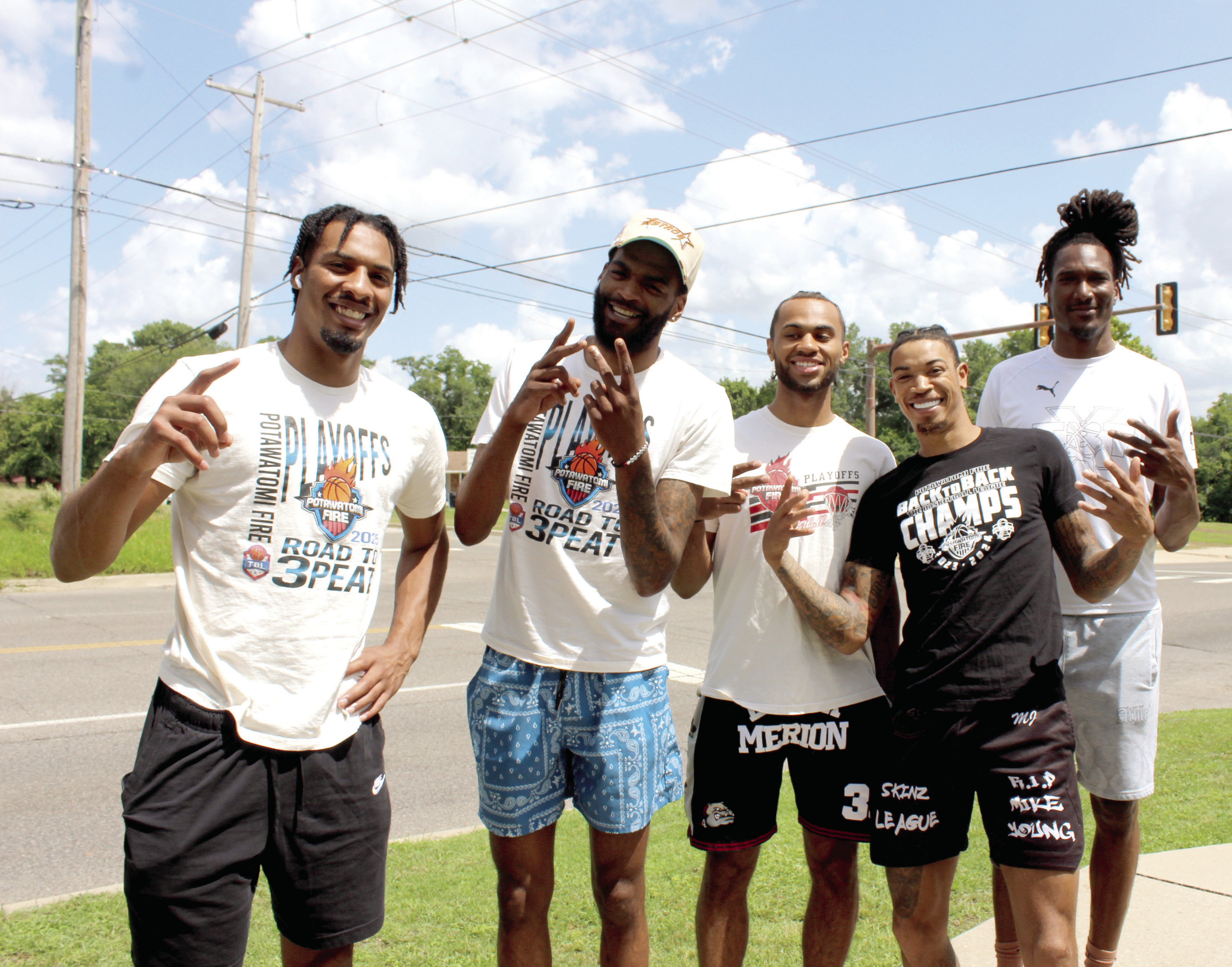 Members of the Potawatomi Fire team pose in front of Epic Snocones at the corner of Beard and Dunbar during the Juneteenth celebration on June 19. Shown, from left, are K.T. Boucham, Jachai Simmons, Jaylen Mahone, Chuck Guy, and Jay Hedgeman. Natasha Dunagan, Countywide & Sun