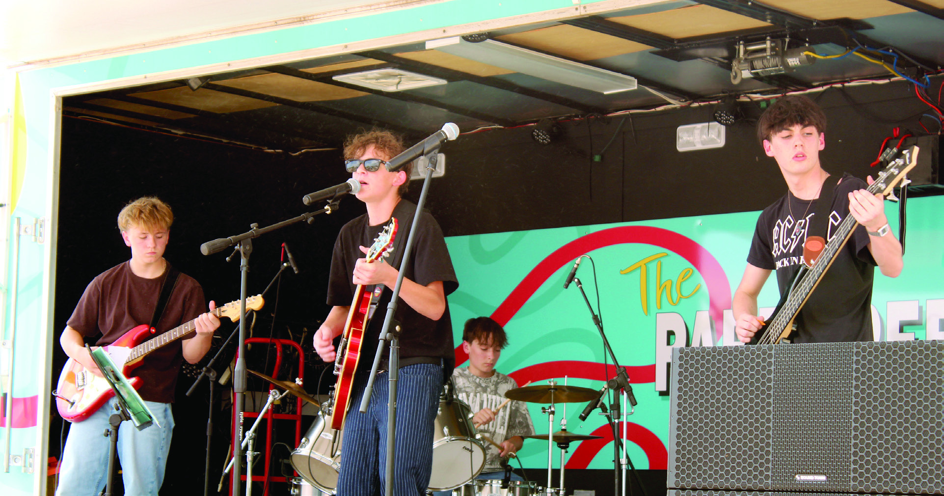 The Shawnee band "Midway" performs on the Pottawatomie County Free Fair Entertainment Stage on Sept. 12. Midway is comprised of Gavin Scarborough on rhythm guitar, Ashton Starkey on lead vocals and electric guitar, Matthias Meek on drums and Daniel Galloway on bass guitar.  See full caption below.