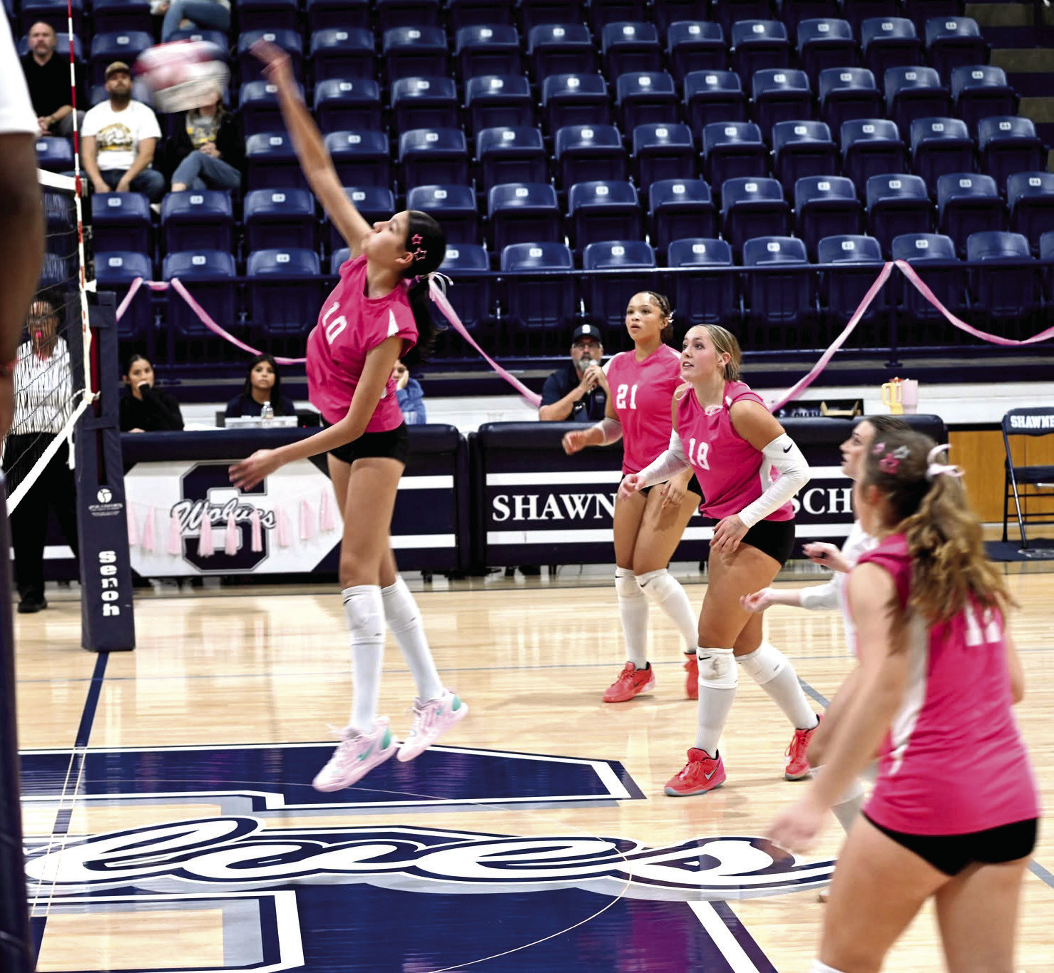 Shawnee sophomore Ava Plumley hits it over the net during the home match against Tecumseh on Oct. 1. The Lady Wolves won, 3-1. The set points were 25-16, 22-25, 25-21, 25-12. Photos courtesy of Kenetta Lisenbee