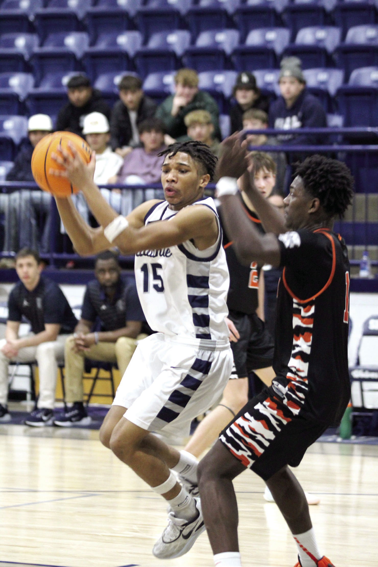 Shawnee sophomore Rah’Mel Slaughter gets ready to make a bucket in the Jan. 7 home game with Booker T. Washington. The Wolves lost, 48-66, and the Lady Wolves also fell, 40-43.