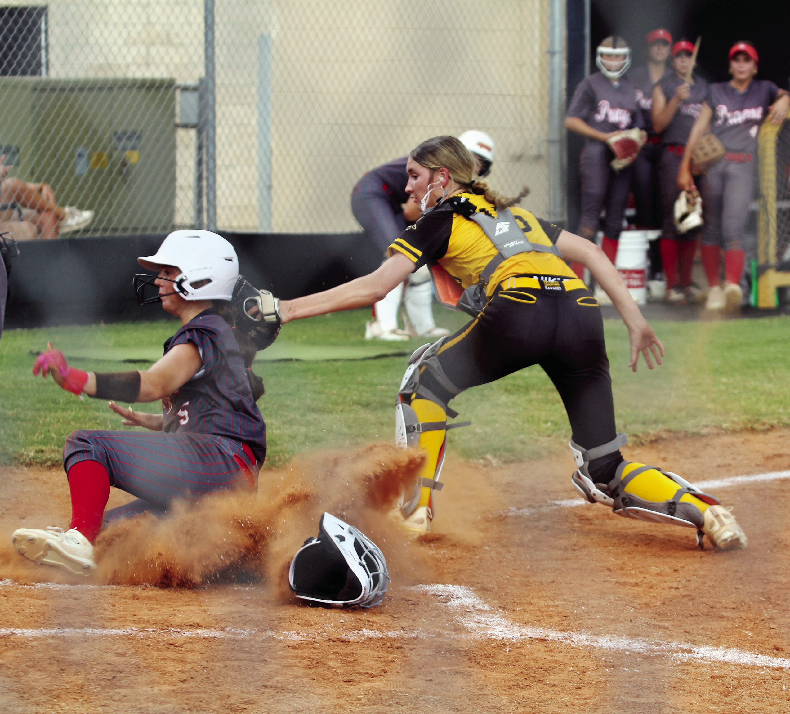 Tecumseh catcher, junior Jaylie Anderson, tags a Prague runner as she slides into home. Natasha Dunagan, Countywide &amp; Sun