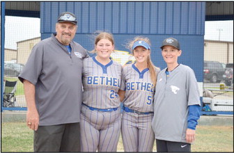 Slow Pitch Seniors pose with their coaches after the last regular season game. From left: Head Coach David Griffin, Seniors: Ashlee Ginn and Brooklyn Duff, Asst. Coach Tara Satterfield. Countywide &amp; Sun/Julie Talton