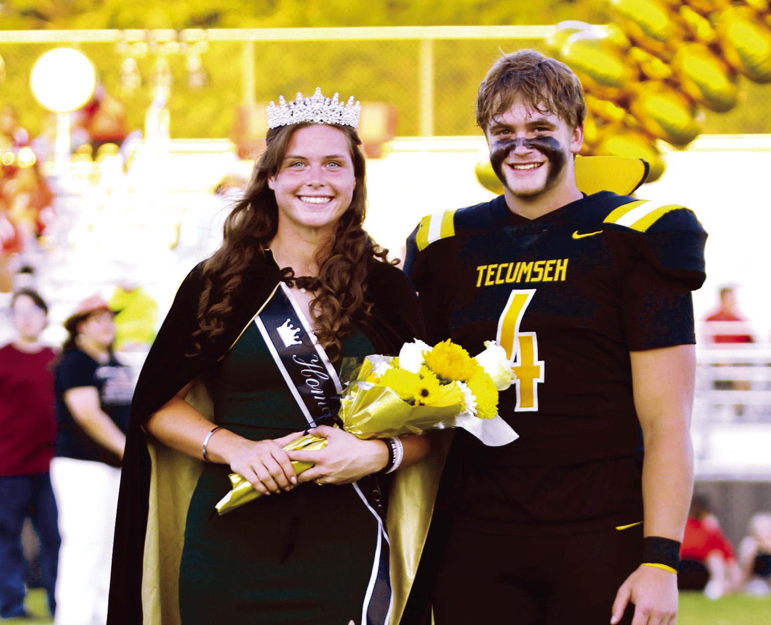 Tecumseh senior Katie Overstreet poses with Braxton Meier after she was crowned Queen during the Tecumseh High School Fall Homecoming ceremony before the football game with McLoud on Sept. 20. Countywide & Sun/Natasha Dunagan 