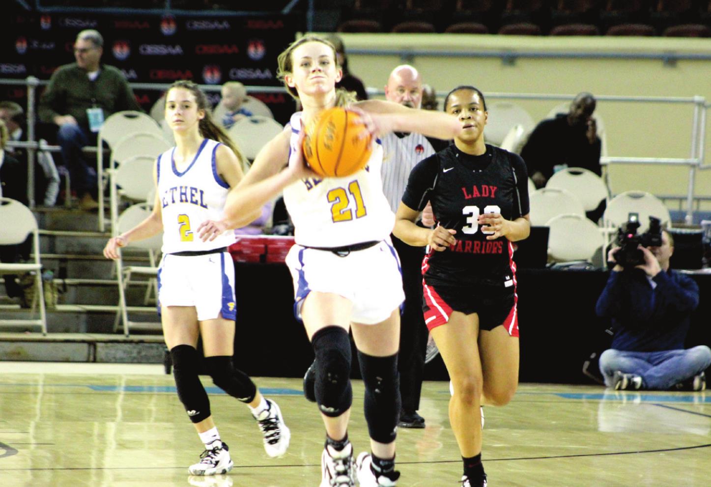 Bethel’s Josie Megehee hurls an unsuccessful hail Mary toward the opposite basket before the halftime buzzer of the Class 3A State Tournament quarterfinal game against Idabel, March 9, at the Fairgrounds Arena. The Bethel Lady Wildcats lost 46-60, but they ended the season with a 22-5 record. Countywide &amp; Sun/Natasha Dunagan