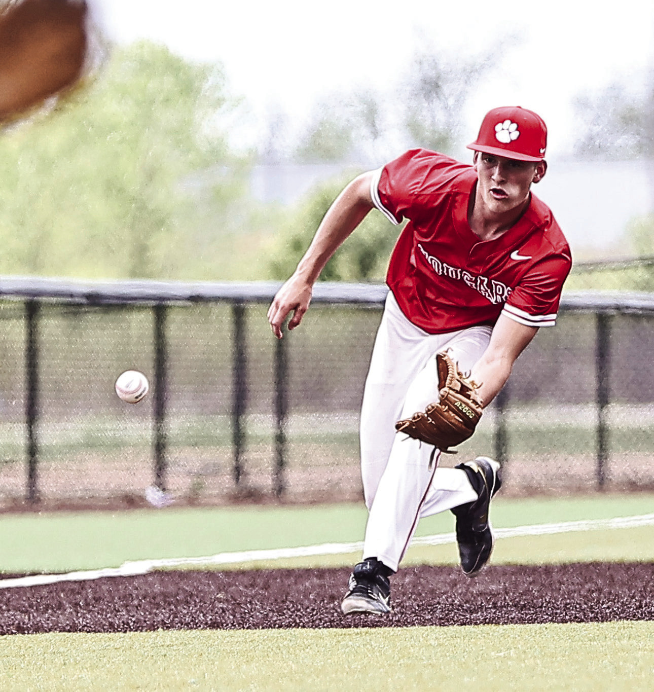 NRC's Landon Rosser gets the ball and throws to second base for the out on April 10.