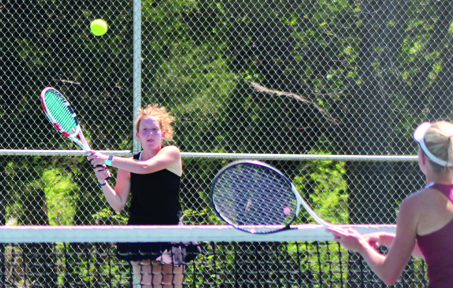 Tecumseh senior Laycee Thoma sends the ball back during the tennis match against Byng on April 21. Jessica Jones, THS Intern, Countywide &amp; Sun