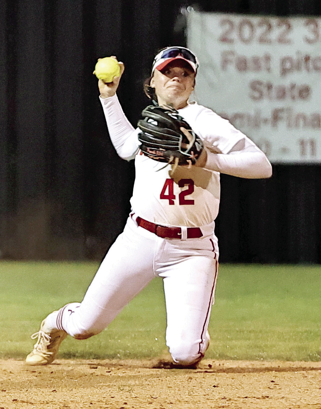 Noth Rock Creek's Sarah Campbell throws to first for the out. Photo courtesy of Gowin Photography
