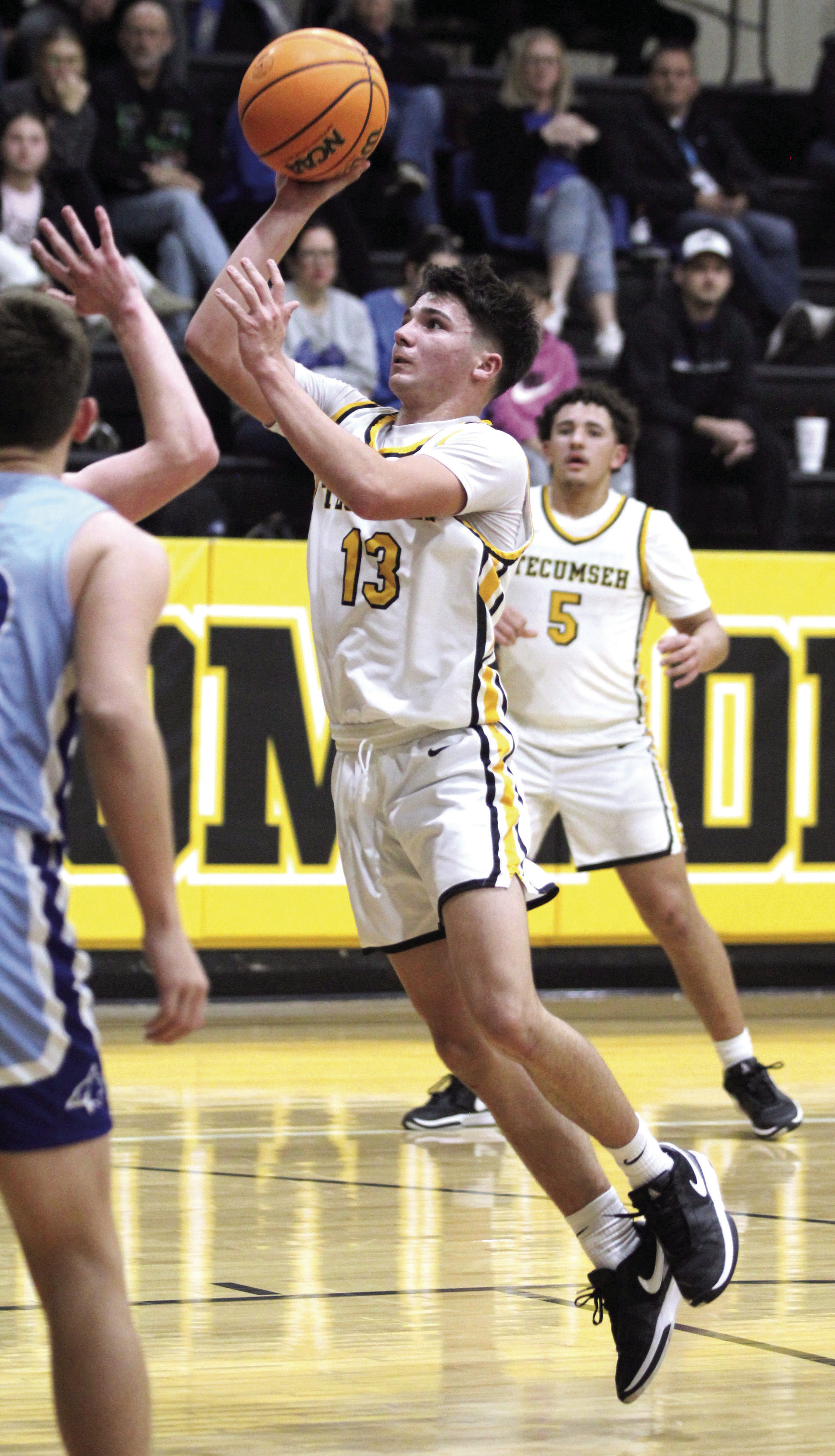 Tecumseh’s Creed Wright tries for a jump shot in the third quarter of the Dec. 19 home game with Bridge Creek. The Savages lost this close game, 60-63, but the Lady Savages won, 40-20, earlier that evening. Countywide & Sun/Natasha Dunagan