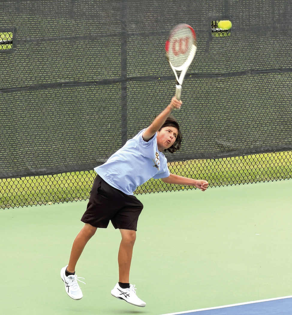 Tecumseh freshman Noah Mason serves in #2 Doubles at the Elk City Tennis Tournament on April 22. Along with doubles partner Jaxon McCullough, Mason placed sixth. The #1 Doubles team of Xzavier Kommer and Eli Mullins took seventh. Both Ted Belshe, in #1 Singles, and Christian Falcon, in #2 Singles, earned fifth place. The Savages tennis team also placed fifth. Photo courtesy of Jennifer McKnight