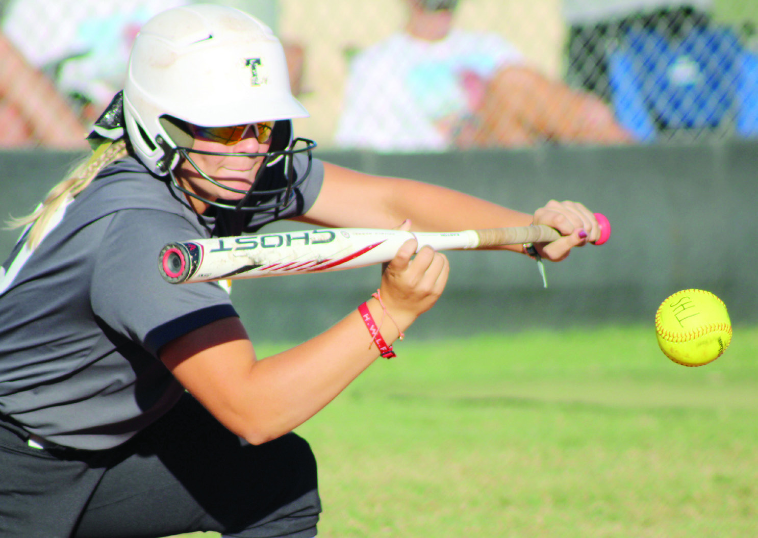 Tecumseh freshman Embrie Smith makes a sacrifice bunt during the Class 4A Fastpitch Softball Super Regionals on Oct. 5. This was in the second of three games with Blanchard over two days. The Lady Savages won the first game, 11-4; lost the second game, 2-4; and lost the third game in overtime, 6-8. They finish the season with a record of 32-6. Countywide & Sun/Natasha Dunagan