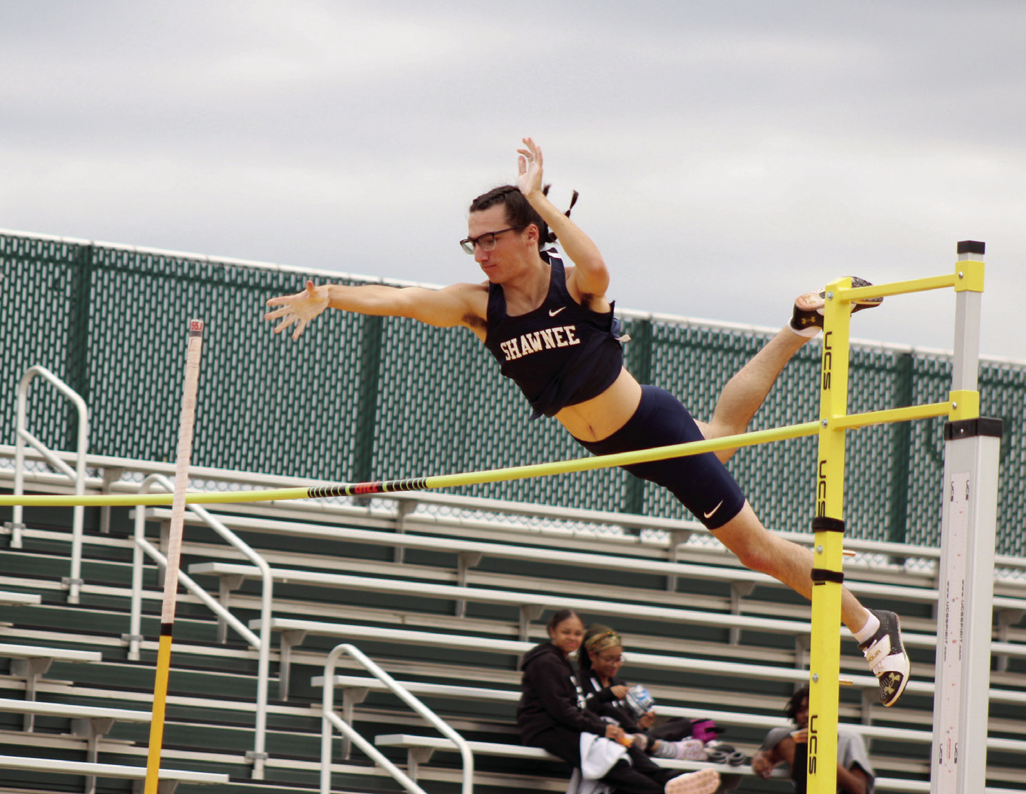 Shawnee’s Traydn Rakestraw lets go of the pole as he competes in the pole vault during the track and field meet held at OBU on April 9. Countywide & Sun/Natasha Dunagan