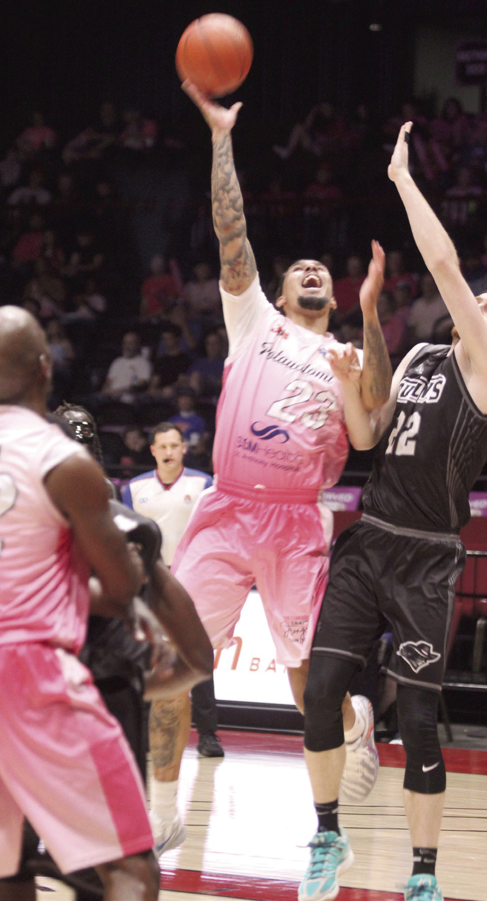 Potawatomi Fire forward Isaiah Wade goes up for a bucket during the April 9 Pink Out home game against the Enid Outlaws. Wade led the team in points that night with 32, plus nine rebounds. The Fire won their 59th game at FireLake Arena with a score of 125-104.