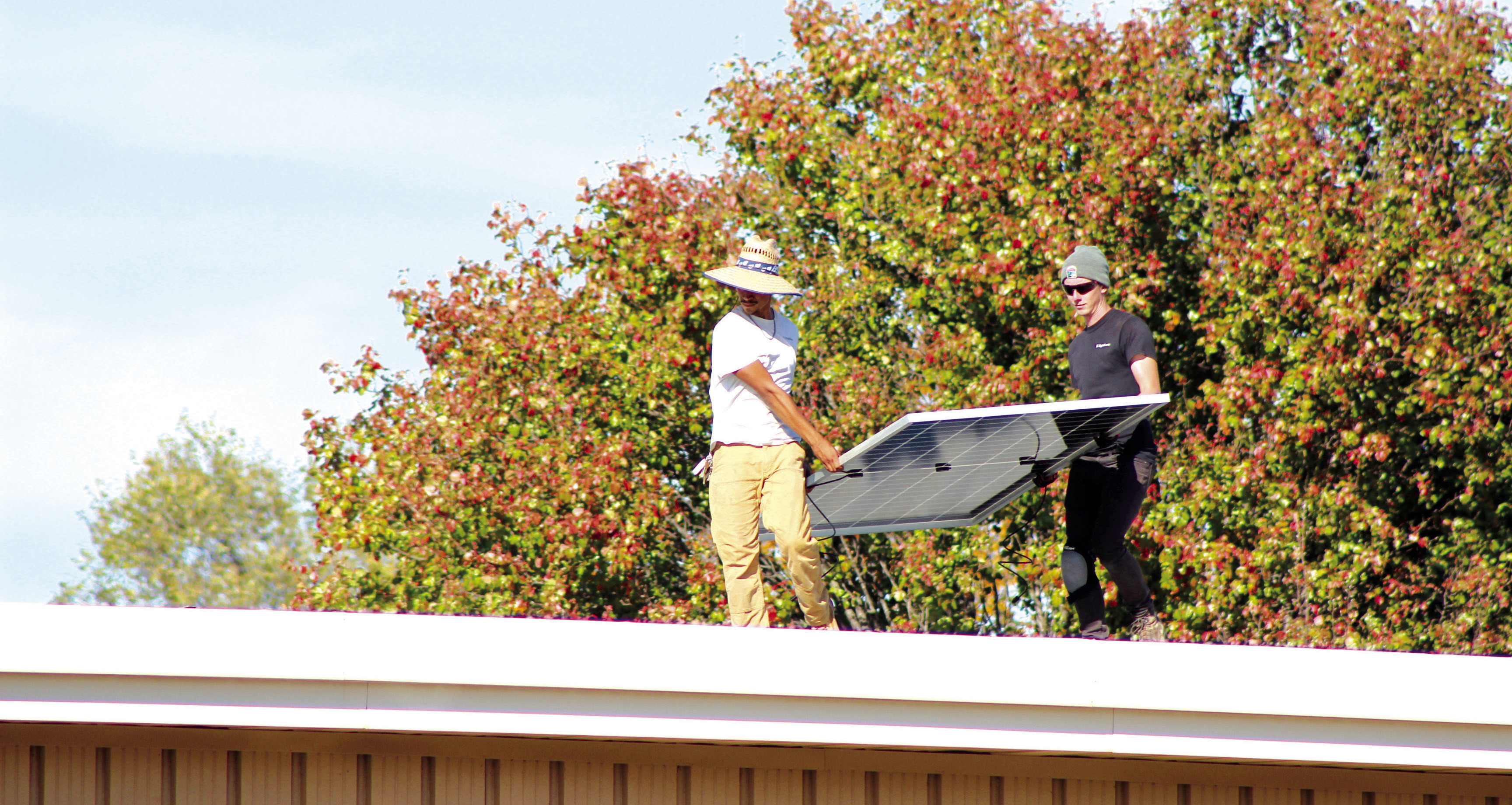 The crew of EightTwenty Solar work on installing 42 solar panels on the Earlsboro Elementary School building on Nov. 6. Principal Stacey Barton said he worked with OG&E through the CLEAResult Program to make this happen. They were on a waiting list for the past five years. Countywide & Sun/Natasha Dunagan
