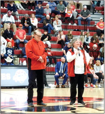 Carol Carter (right) shares memories of Coach Harold Jones winning seasons as he is honore for the 40th anniversary of the 1983 National Coach of the Year Award. Countywide &amp; Sun/Suzie Campbell