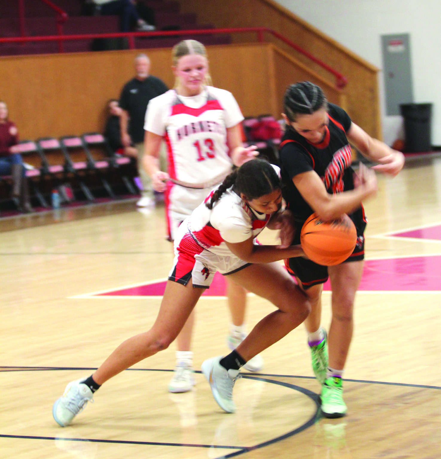 McKenzie Brummett tries to steal the ball during the second quarter of the Jan. 16 home game against Strother. The Lady Hornets won 67-64 in overtime. Later, the Hornets lost 47-59.