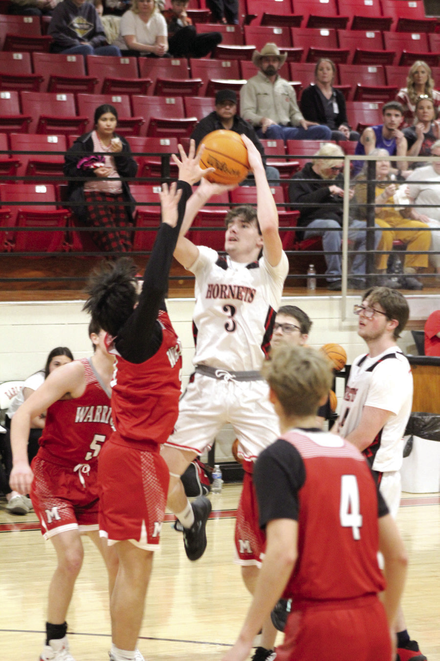 Macomb sophomore Radlee Blaine sinks a jump shot in the second quarter of the Class B Regional game with Maysville, held at Earlsboro on Feb. 15. The Hornets won that game, 54-48, but lost the second regional game to Carney, 46-73, the next day. Countywide &amp; Sun/Natasha Dunagan