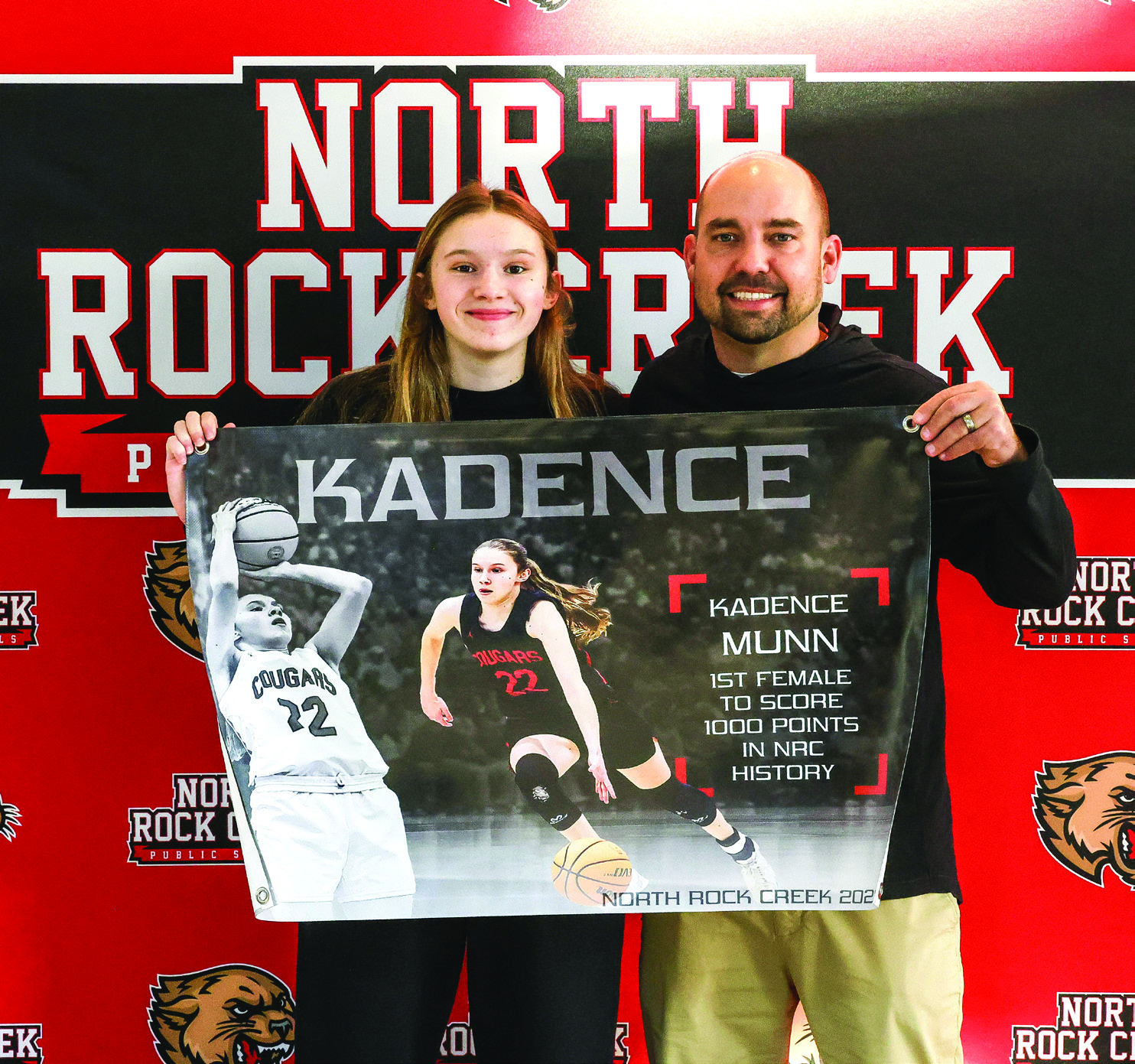 On Jan. 21st at the Washington tournament, Kadence Munn scored her 1000 point in her high school career against Tecumseh. Pictured are Kadence Munn and NRC Basketball Coach Lance Blocker.