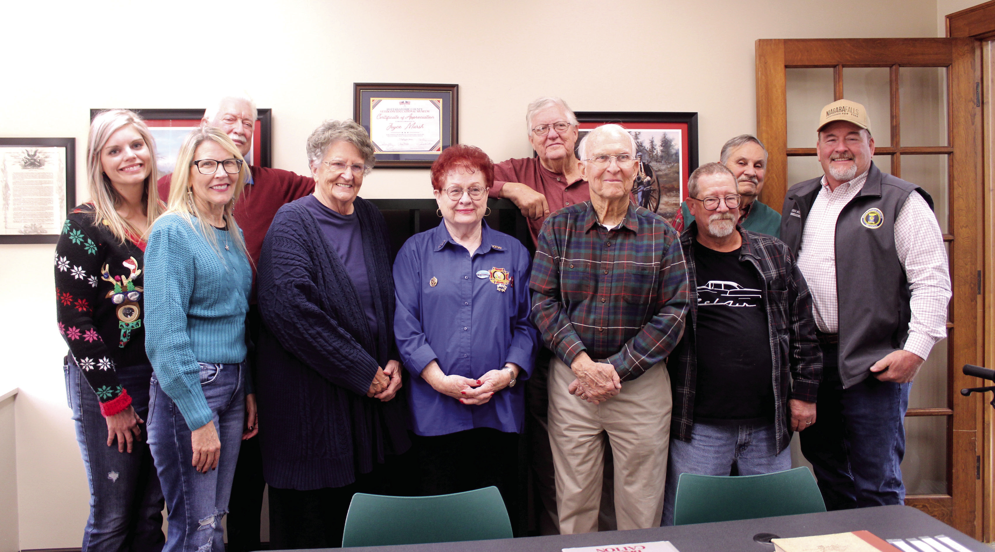 The Shawnee Veterans Memorial Committee and Pottawatomie County Commissioners pose with artist Joyce Marsh. See full cutline below. Natasha Dunagan, Countywide & Sun
