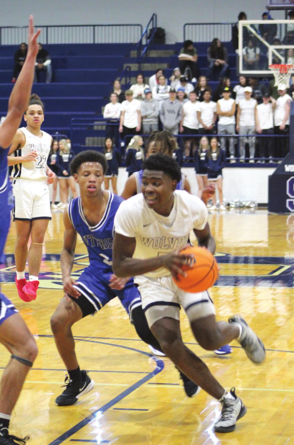 Shawnee’s T.J. Bishop drives to the basket during the second quarter of the home game against Guthrie. Countywide &amp; Sun/Natasha Dunagan