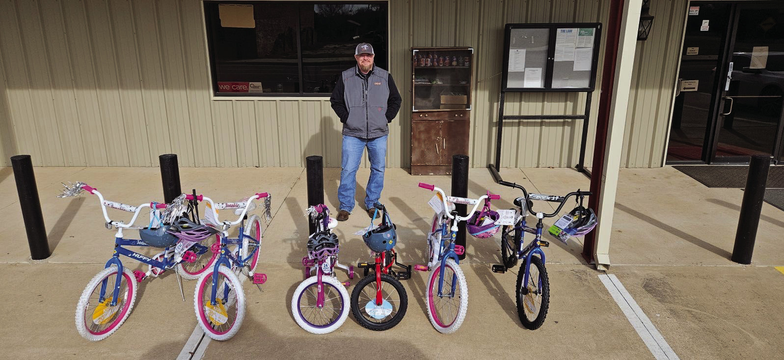 This holiday season, OG&E is donating 330 bikes to children in communities across its service area in Oklahoma – including in Earlsboro and Asher. Josh “Dude” Robertson from OG&E’s Shawnee Service Center delivers bicycles to the Earlsboro Town Hall. Thanks to the electric company’s generous donation, many children in both Earlsboro and Asher received a new bike just in time for the holiday season. Photo provided by OG&E