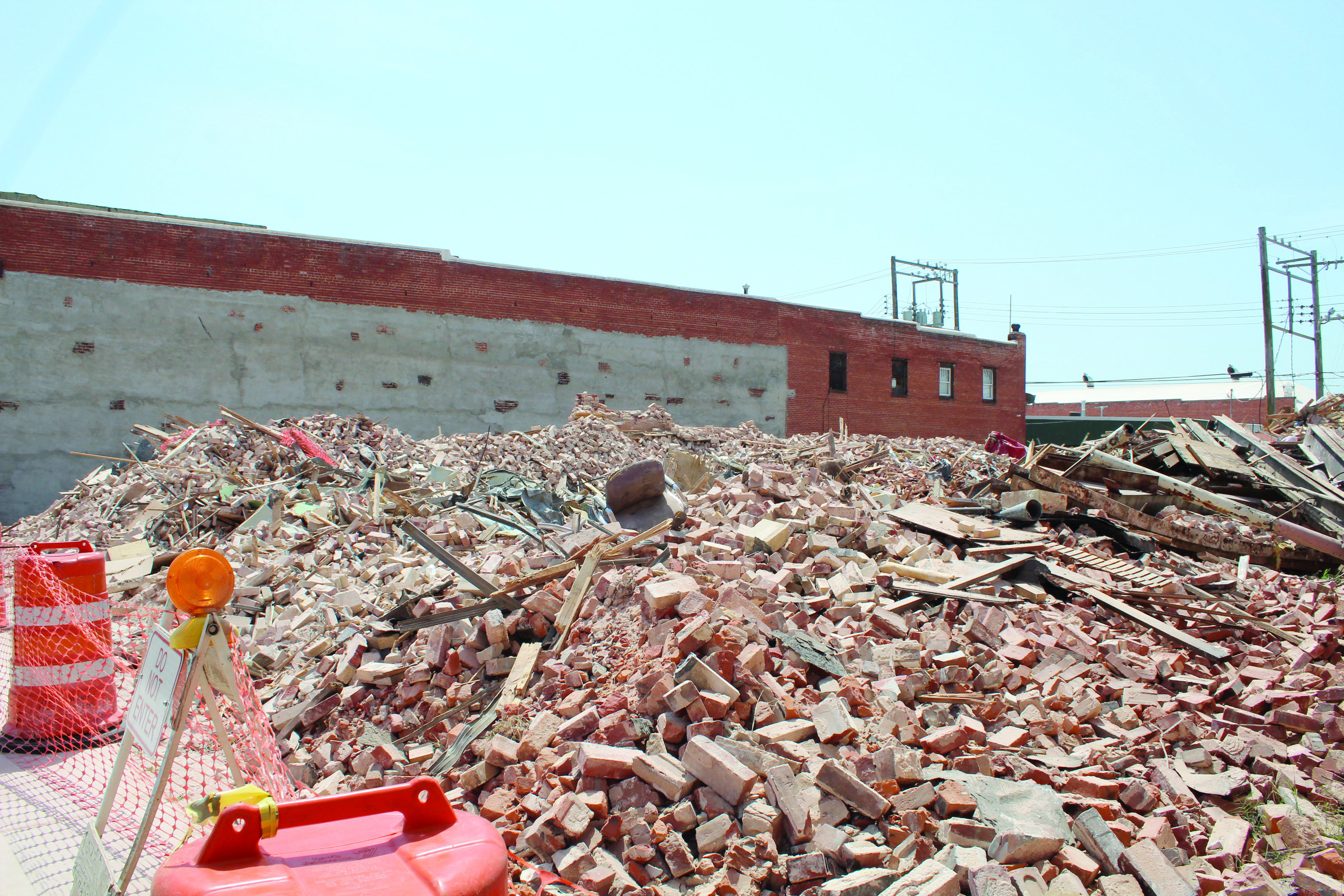 An office chair remains in the rubble which was once Pott. County Book & Office Supply at 109 E. Main in Shawnee. The building had its western wall blown out during the April 19 tornadoes. Then, its roof collapsed on July 3, and after closing that block, the city demolished the 116-year-old former Kress’s building on July 21. Pott. County Book & Office Supply had been in the building since 1983, and owner Terry Webb said, at this time, he doubts they will rebuild. Countywide & Sun/Natasha Dunagan