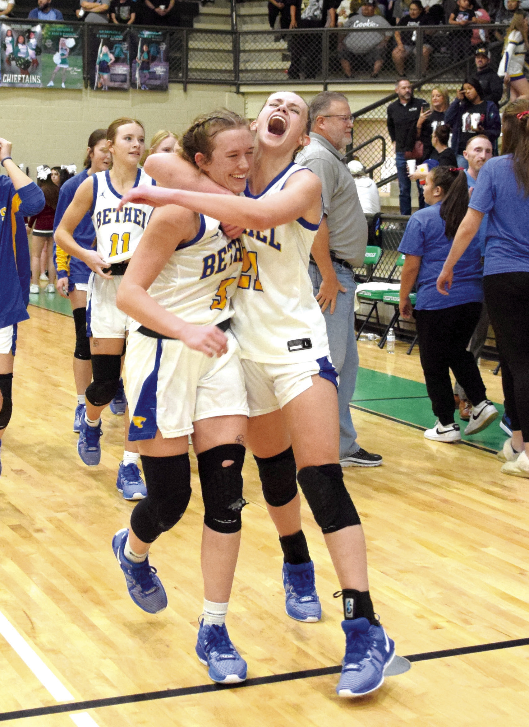 Bethel Junior Josie Megehee celebrates with Senior Brooklyn Duff as they walk off with a win in the Area Championship last Saturday. Countywide & Sun/Julie Talton