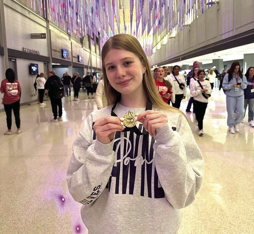 Shawnee senior Senior Mia Bryant shows off her hardware. Photo provided by SPS