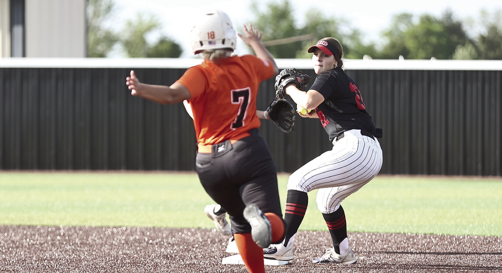 Morgan Bertram makes the out at second against Lexington in the double-header on April 13, hosted by NRC. NRC won both games, 15-0 and 19-5. Photo Courtesy of Gowin Photography