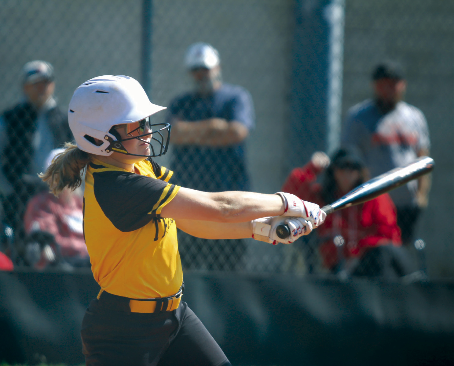 Tecumseh sophomore Josie Walker hits a single in the sixth inning, which drives in two runs, during the Dale-Tecumseh Tournament game against Prague held at Tecumseh on Sept. 7. The Lady Savages won that game, 4-0, and they only lost one out of five games over the three-day tourney. Countywide & Sun/Natasha Dunagan