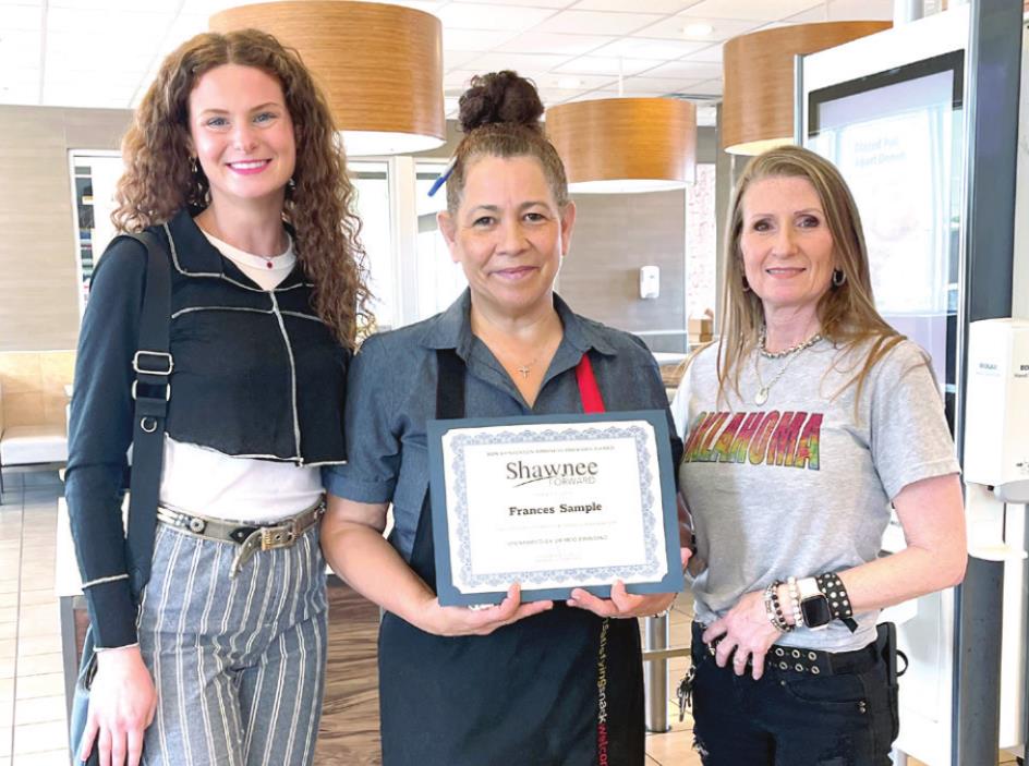 Award recipient Frances Sample is pictured in the center with Shawnee Forward representatives. Photo provided