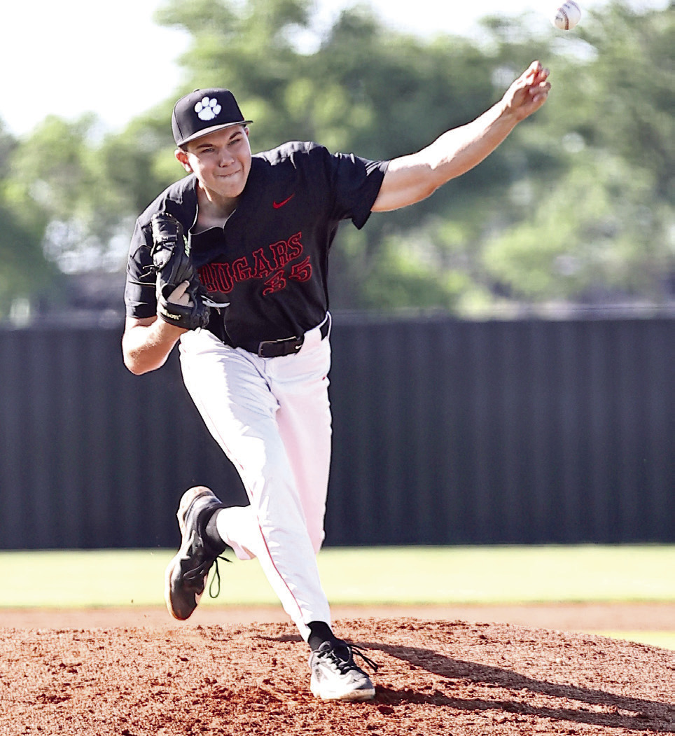 North Rock Creek's senior Cason Coomer hurls the ball across home plate. Photo courtesy of Gowin Photography