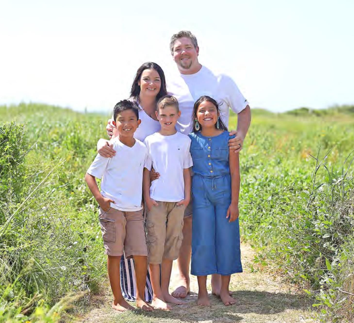 Kaycee and David Koonce pose with their children pictured from left, Troy, Nathaniel, and London.