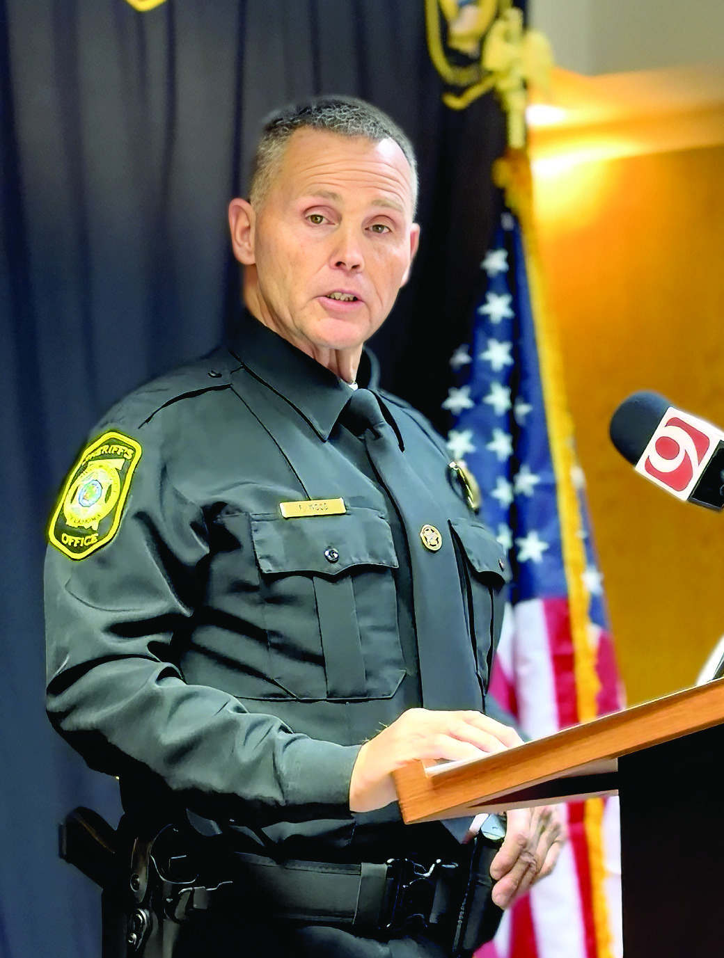 Pottawatomie County Sheriff Freeland Wood expresses his appreciation for all involved in this case. To the family and friends, Wood said they remain committed to seeking the truth and allowing the evidence to guide their work. Photos at podium by Suzie Campbell, Countywide & Sun