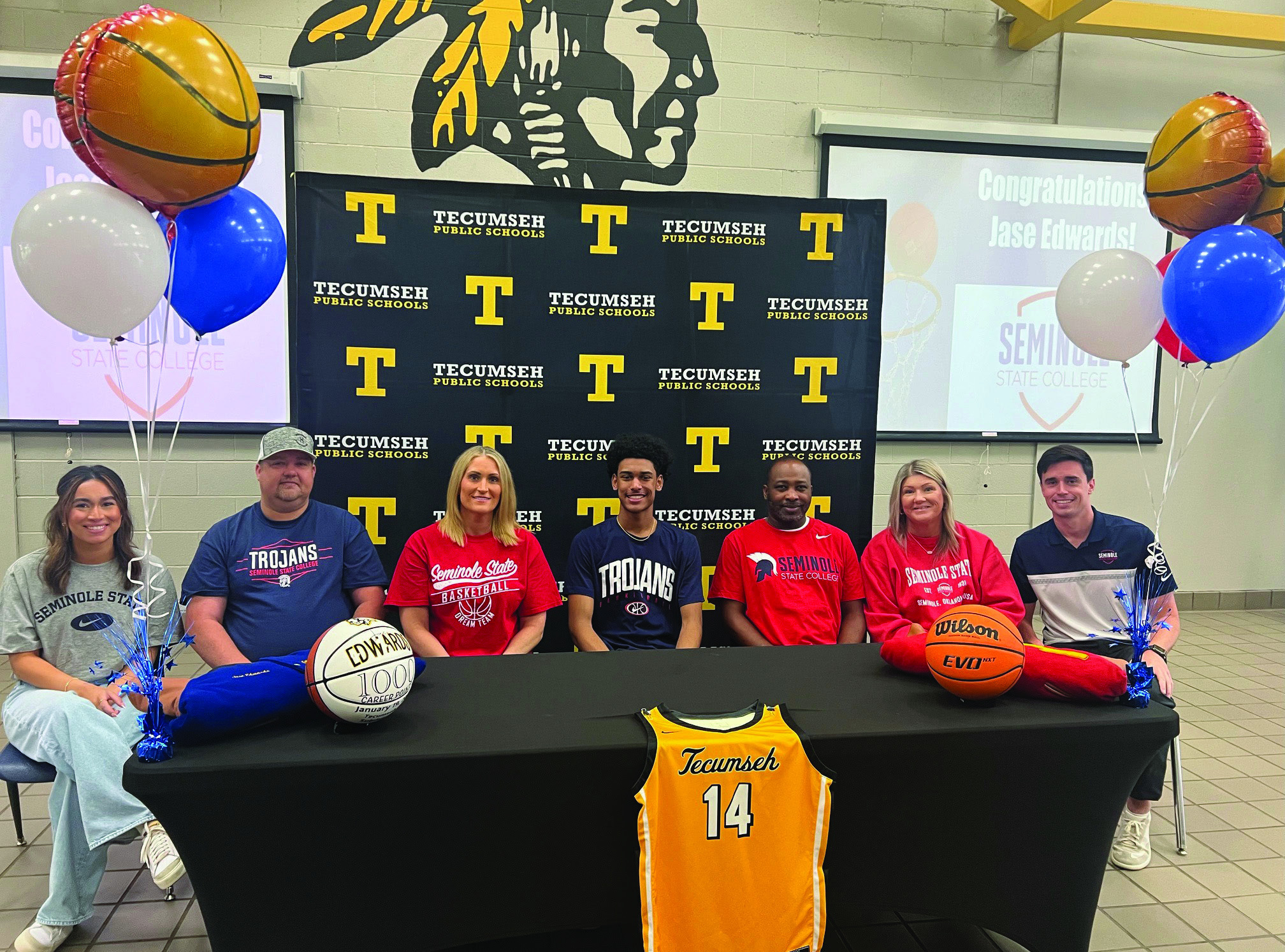Tecumseh senior Jase Edwards signed a letter of intent in basketball for Seminole State College on May 6. Shown, from left, is Jayden Edwards, sister; Joe Hooser, stepfather; Sarah Hooser, mother; Edwards; Tecumseh Head Boys Basketball Coach Bryant Edwards, father; Michelle Edwards, stepmother; and Lucas Hunter, SSC head coach. Photo provided.